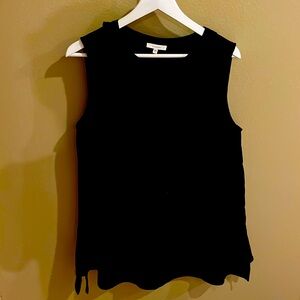 Super versatile sleeveless tunic with ruffle detail and tie at neck